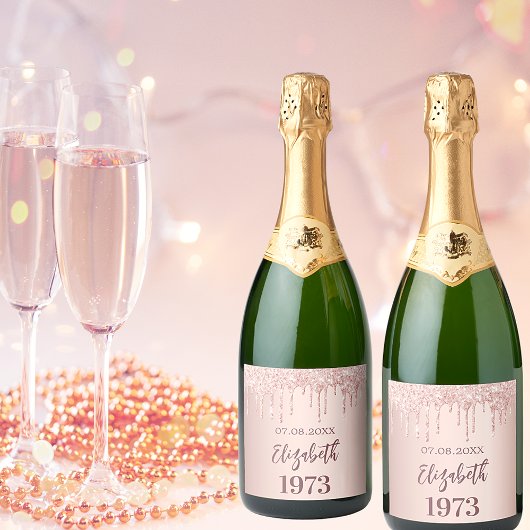 Roos goudglitterdruppels op feestdag sparkling wijnetiket