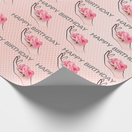 Roos in de hand op hart cadeaupapier (Hoek)