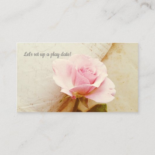 Roos op boekpagina's visitekaartje (Achterkant)