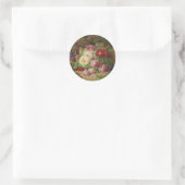 Roos stuk op de bosvloer met vlinders ronde sticker (Tas)