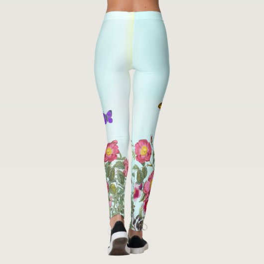 Roos tuin met vlinders op blauwe achtergrond leggings (Achterkant)