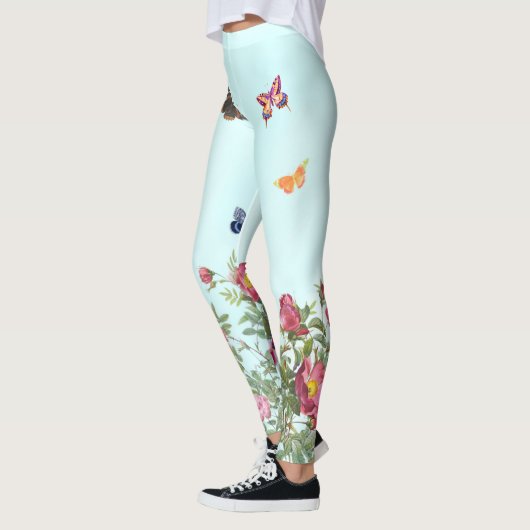 Roos tuin met vlinders op blauwe achtergrond leggings (Links)