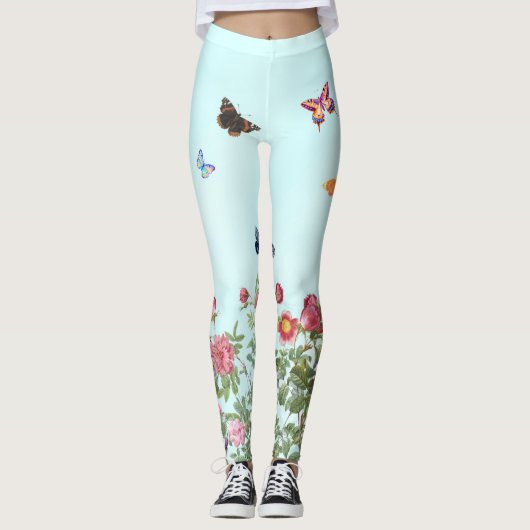 Roos tuin met vlinders op blauwe achtergrond leggings (Voorkant)