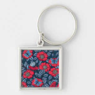 Roos van honden en vlinders, blauw en rood sleutelhanger