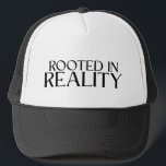Rooted In Reality Minimalist Typewriter  Trucker Pet<br><div class="desc">Keep a clear head. A classic mesh-back trucker hat featuring a bold typographic statement for those who stay anchored in the real world.</div>