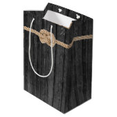 Rope Knot op zwart hout Medium Gift Bag Medium Cadeauzakje (Achterkant Gekanteld)