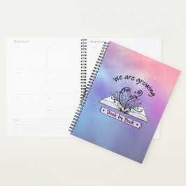 Rosa Blumen, die aus Buch wachsen Planner