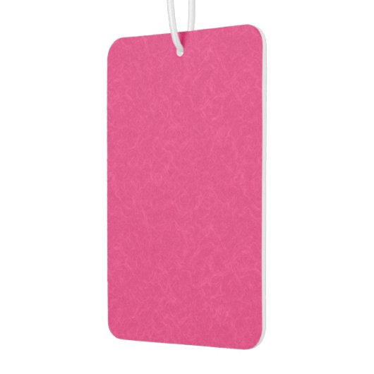 Rosa gestructureerd oppervlak met subtiel draaiend luchtverfrisser (Links)