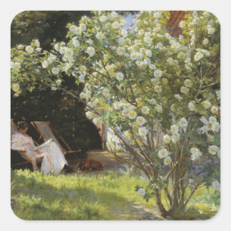 Roses. Marie Krøyer seated in the deckchair Vierkante Sticker