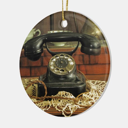 Roterende telefoon keramisch ornament (Links)