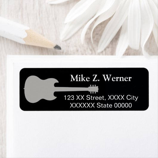 rots zwart van gitaarspeler etiket (Insitu)