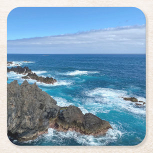 Rotsen in zee kartonnen onderzetters