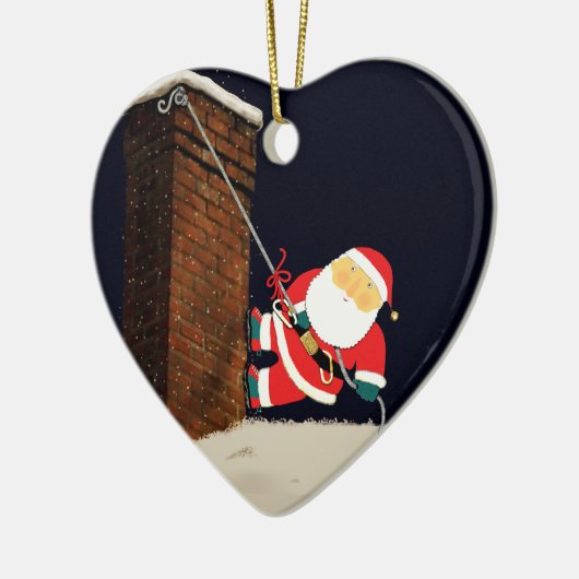 Rotsklimmen met kerstcadeau keramisch ornament (Links)