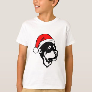 Rottweiler Dog draagt een rode kerstkerstkerstkers T-shirt