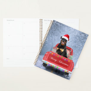 Rottweiler Dog in sneeuw, met kersttruck Planner