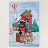 Rottweiler Dog in sneeuwkersthondenhuis Legpuzzel (Verticaal)