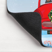 Rottweiler-hond in auto met kerstman muismat (Hoek)