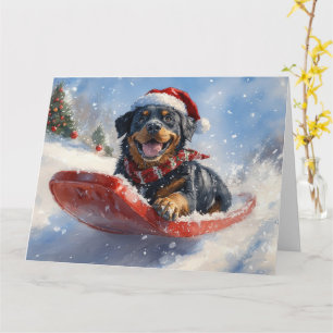 Rottweiler Hond in Sledge Laat het Sneeuw Kerstmis Kaart
