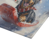 Rottweiler-hond in slee Laat het sneeuwen Kerstmis Snijplank (Hoek)
