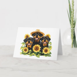 Rottweiler honden omringd door zonnebloemen kaart