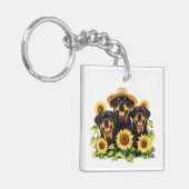 Rottweiler honden omringd door zonnebloemen sleutelhanger (Voorkant Links)