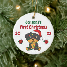 Rottweiler kerstbaby's eerste kerstmis