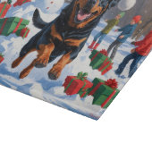 Rottweiler loopt in de sneeuw met kerst Pet Snijplank (Hoek)