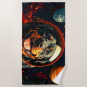 Rottweiler onderzoekt strandlaken (Voorkant)