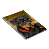 Rottweiler Pup Lying On The Ground In Forest Notitieboek (Rechterzijde)