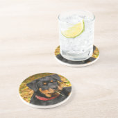 Rottweiler Pup Lying On The Ground In Forest Zandsteen Onderzetter (Zijkant)