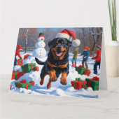 Rottweiler Rent in de Sneeuw met Kerstmuts Kaart (Voorkant)
