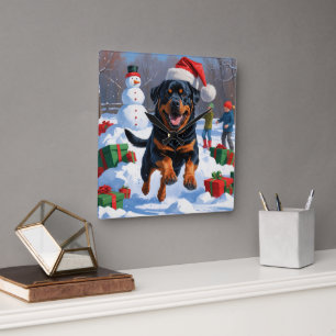 Rottweiler Rent in de Sneeuw met Kerstmuts Vierkante Klok