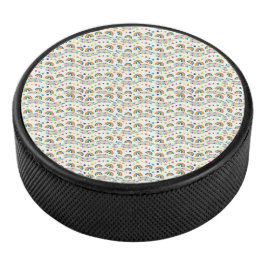 Round car accessory with a cheerful rainbow  hockey puck