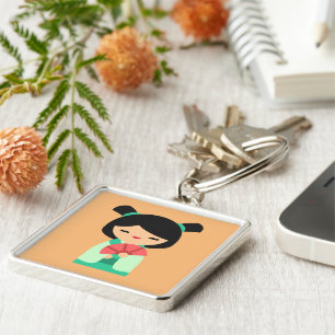 Roze aqua peach Kokeshi Japanse poppen Sleutelhanger