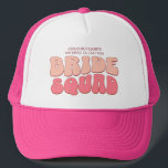 Roze Bachelorette Party Bruid Squad Bruidsmeisje Trucker Pet<br><div class="desc">Maak een plons op uw aankomende vrijgezellenfeest met deze prachtige retro vrijgezellenfeest gepersonaliseerde merchandise. Of je nu een strandtrip, een meisjesvakantie of een beste vriendenvakantie aan het vieren bent, deze op maat gemaakte groovy vrijgezellenfeestartikelen zijn de perfecte aanvulling op je onvergetelijke vakantie. Voeg een persoonlijke touch toe aan je vrijgezellenfeestsouvenir...</div>