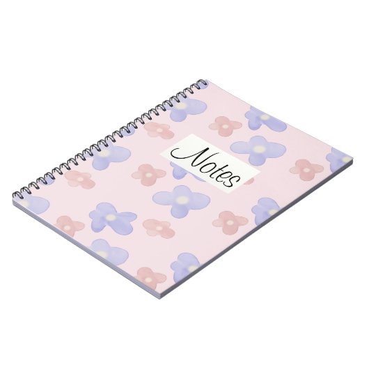 Roze blauwe bloemen op pastel roze notitieboek (Linkerzijde)