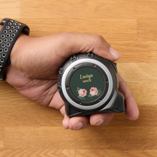 Roze bloem en bladeren op donkergroen rolmaat (Huis)