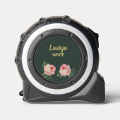 Roze bloem en bladeren op donkergroen rolmaat (Voorkant)