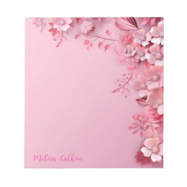 Roze bloemen decoratie met roze achtergrond notitieblok