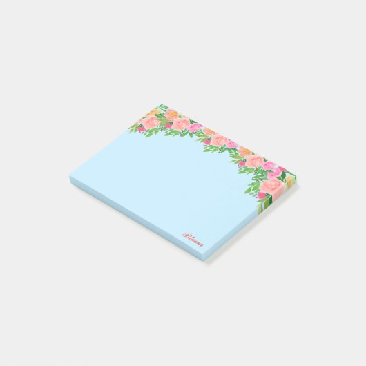 Roze bloemen en kalligrafie op lichtblauw post-it® notes (Schuin)