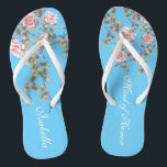 Roze Bloemen Felblauwe Achtergrond Huwelijkscadeau Teenslippers<br><div class="desc">De flops hebben een illustratie van roze bloemen op een heldere blauwe achtergrond en een klassieke typografie voor huwelijkswoorden. Dit elegante paar slippers is een mooi en memorabel cadeau voor de leden van de bruiloftsgroep: bruidstribuut, bruidsmeisjes, moeder van de bruid, bruidsmeisje van eer... voeg een stijlvolle dosis glamour toe aan...</div>