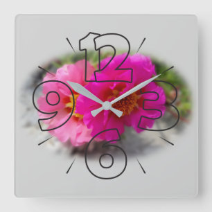 Roze bloemen in de zon vierkante klok