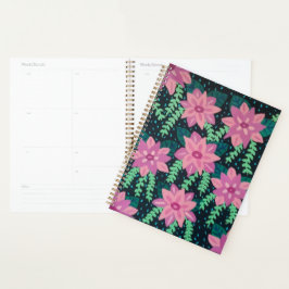 Roze bloemen op zwart planner