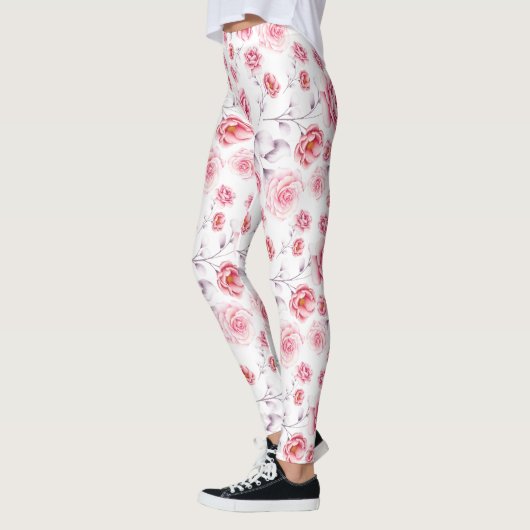 Roze bloemen patroon boven witte leggings (Links)