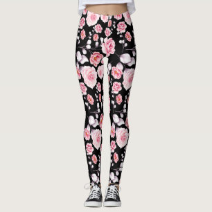 Roze bloemen patroon boven zwart leggings