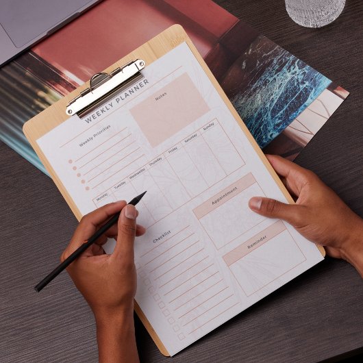 Roze bloemendagelijkse notitieblok