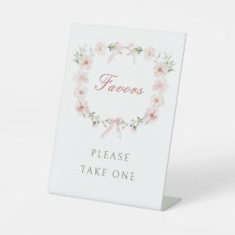 Roze bloemenschilderij als favoriet reclamebord met voetstuk