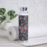 roze bloempatroon en pooldot waterfles<br><div class="desc">floreel en gestippeld.</div>