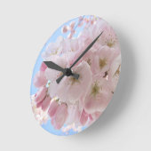 Roze bloesems Blue Sky. Ronde Klok (Hoek)