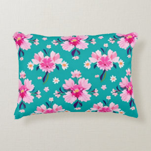 Roze bloesems en bladeren op een turquoise achterg accent kussen